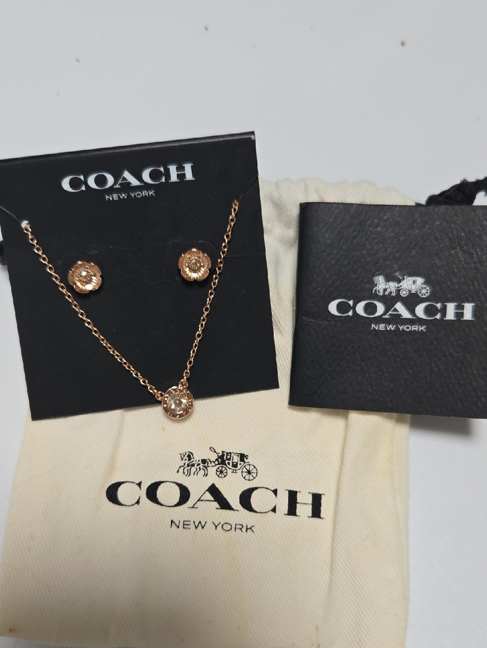 Coach Rose Gold Crystal Pendant Necklace with Matching Studs